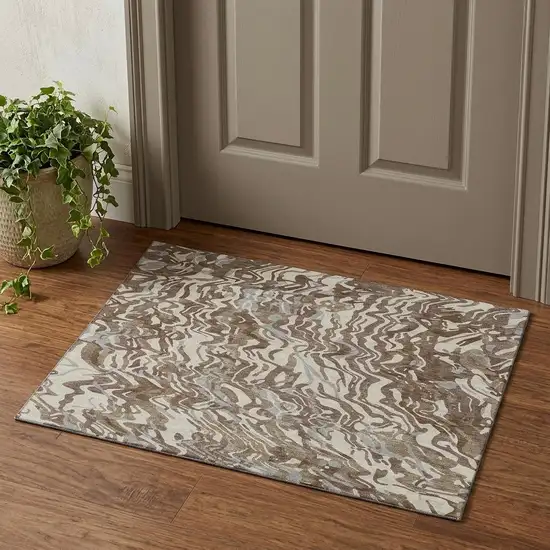 Brown Beige And Taupe Abstract Washable Area Rug With UV Protection Photo 1