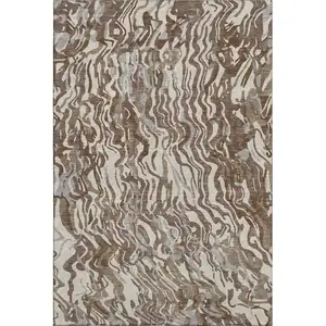 Photo of Brown Beige And Taupe Abstract Washable Area Rug With UV Protection
