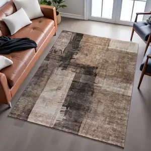 Photo of Brown Beige And Taupe Abstract Washable Area Rug With UV Protection