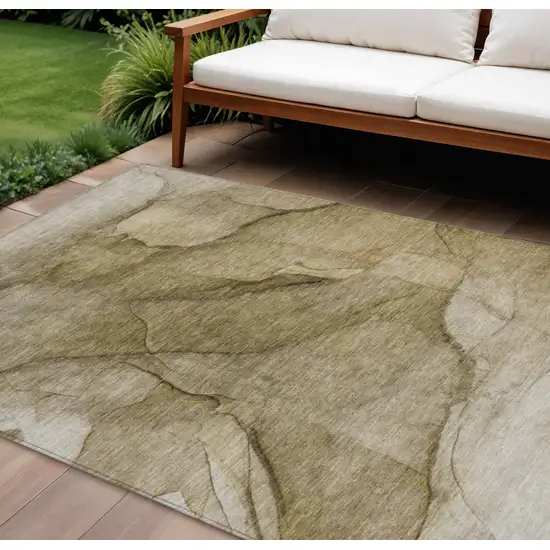 Brown Beige And Taupe Abstract Washable Indoor Outdoor Area Rug Photo 1