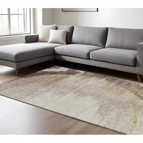 Brown Beige And Taupe Abstract Washable Indoor Outdoor Area Rug Photo 1
