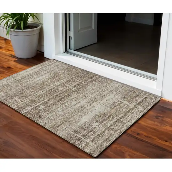 Brown Beige And Taupe Abstract Washable Indoor Outdoor Area Rug Photo 1