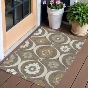 Photo of Brown Beige And Taupe Medallion Washable Indoor Outdoor Area Rug
