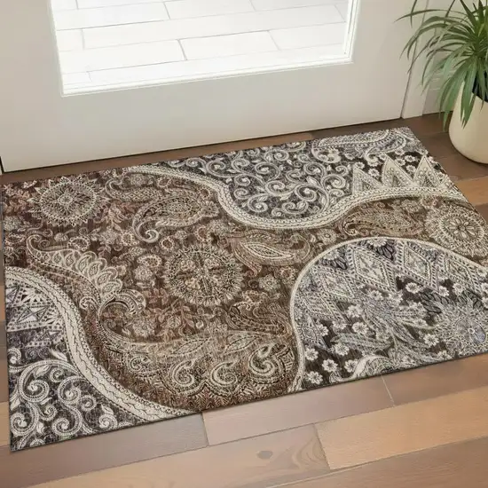Brown Beige And Taupe Paisley Washable Area Rug With UV Protection Photo 1