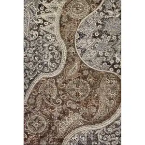 Photo of Brown Beige And Taupe Paisley Washable Area Rug With UV Protection