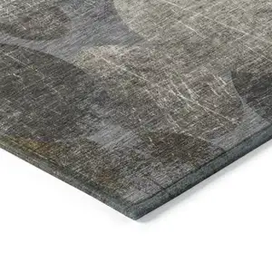 Photo of Brown Beige and Ivory Abstract Washable Non Skid Indoor Outdoor Area Rug