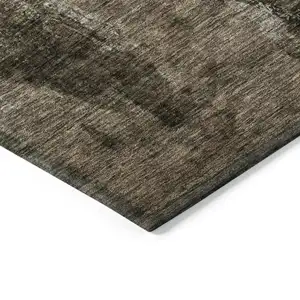 Photo of Brown Black And Beige Abstract Washable Indoor Outdoor Area Rug