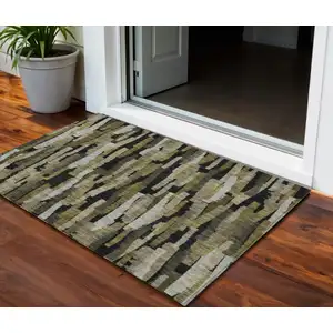 Photo of Brown Black And Green Striped Washable Indoor Outdoor Area Rug
