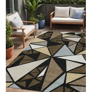 Photo of Brown Black And Ivory Geometric Washable Indoor Outdoor Area Rug