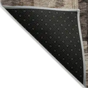 Photo of Brown Black And Tan Abstract Washable Indoor Outdoor Area Rug