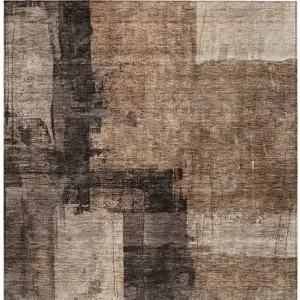 Photo of Brown Black And Tan Abstract Washable Indoor Outdoor Area Rug