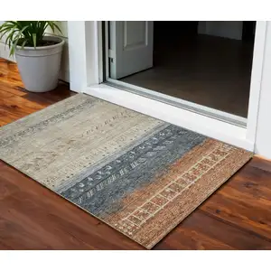 Photo of Brown Blue And Beige Southwestern Washable Indoor Outdoor Area Rug