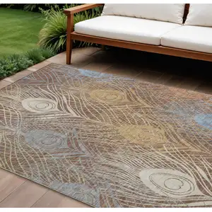 Photo of Brown Blue And Gold Floral Washable Indoor Outdoor Area Rug