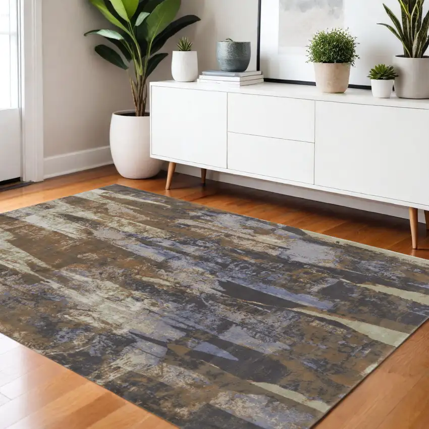 Brown Blue And Ivory Abstract Distressed Area Rug Photo 1