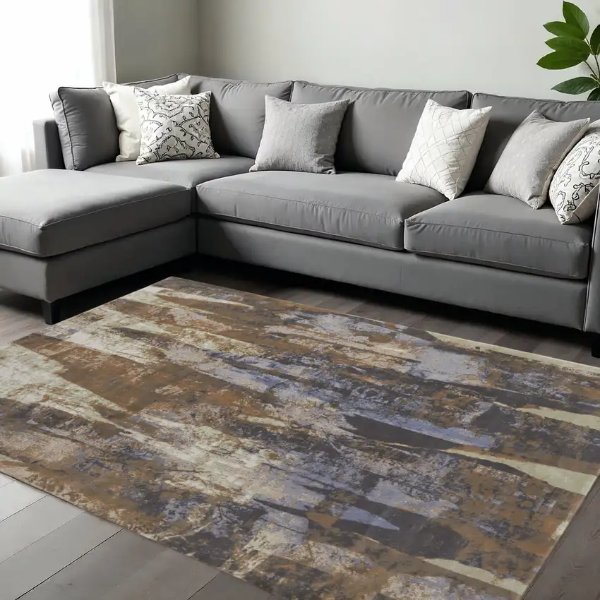Brown Blue And Ivory Abstract Distressed Area Rug Photo 1