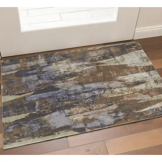 Brown Blue And Ivory Abstract Power Loom Distressed Area Rug Photo 1