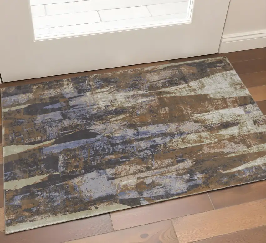 Brown Blue And Ivory Abstract Power Loom Distressed Area Rug Photo 1