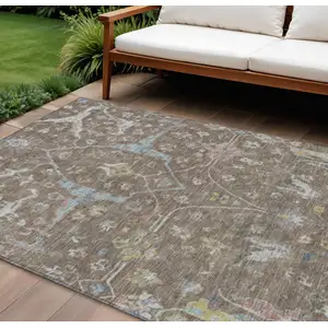 Photo of Brown Blue And Ivory Floral Washable Indoor Outdoor Area Rug