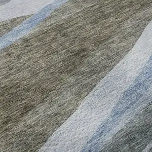 Photo of Brown Blue And Silver Abstract Washable Area Rug With UV Protection