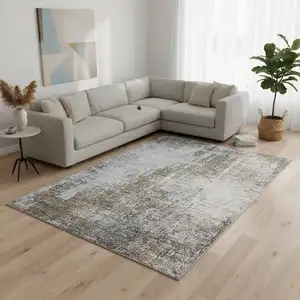 Photo of Brown Blue And Taupe Abstract Washable Area Rug With UV Protection