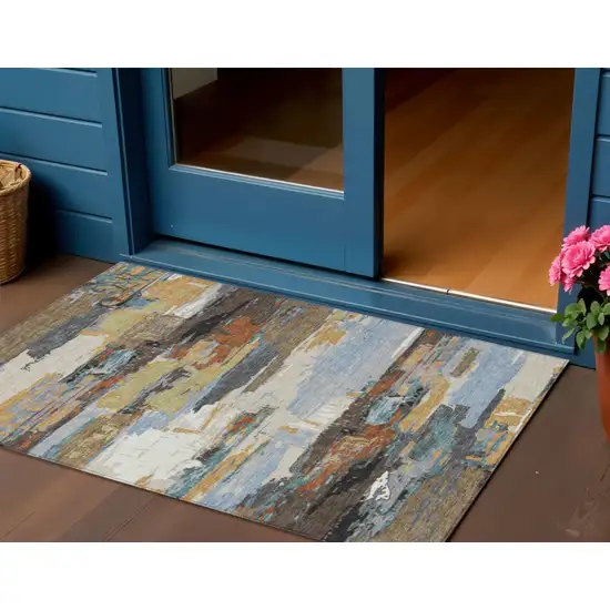 Brown Blue Ivory And Gold Abstract Washable Indoor Outdoor Area Rug Photo 1