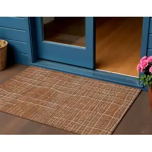 Photo of Brown Copper And Gray Striped Washable Indoor Outdoor Area Rug