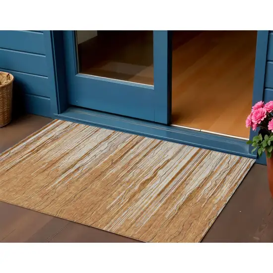 Brown Copper And Ivory Striped Washable Indoor Outdoor Area Rug Photo 1