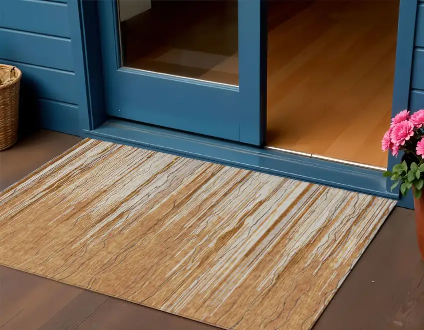 Brown Copper And Ivory Striped Washable Indoor Outdoor Area Rug Photo 1