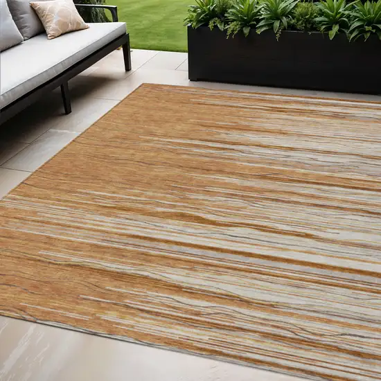 Brown Copper And Ivory Striped Washable Indoor Outdoor Area Rug Photo 1