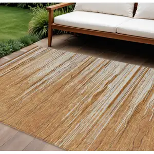 Photo of Brown Copper And Ivory Striped Washable Indoor Outdoor Area Rug