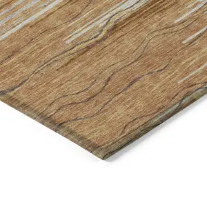 Photo of Brown Copper And Ivory Striped Washable Indoor Outdoor Area Rug