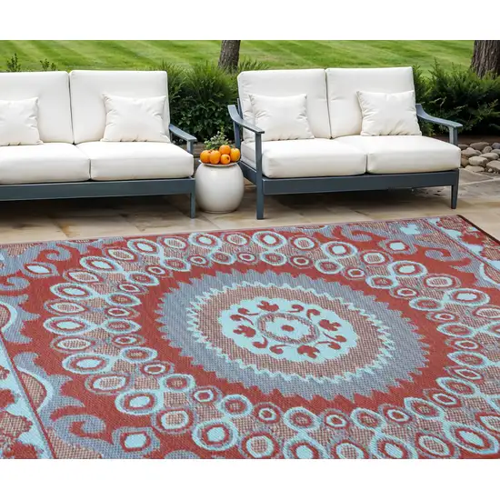 Brown Floral Machine Braided Distressed Area Rug With UV Protection Photo 1