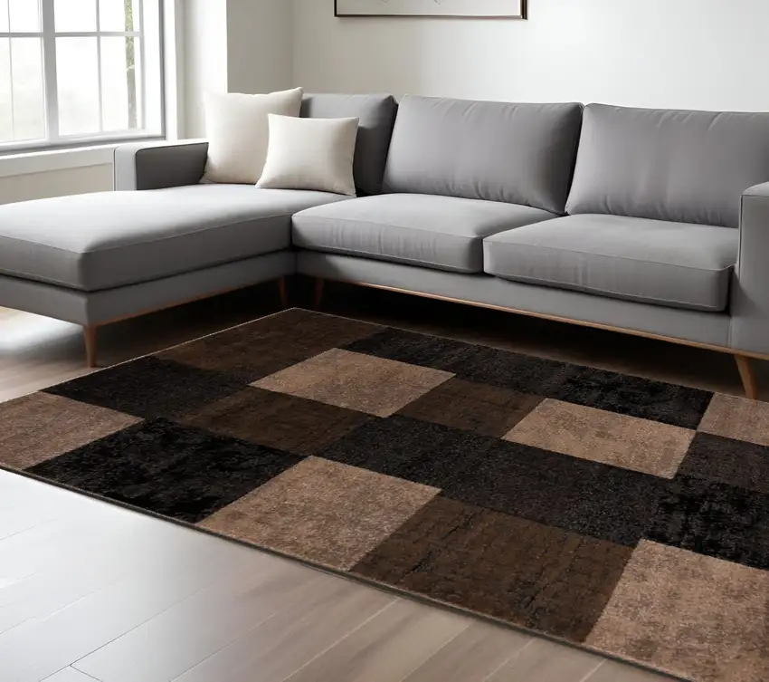 Black And Brown Geometric Distressed Area Rug Photo 1