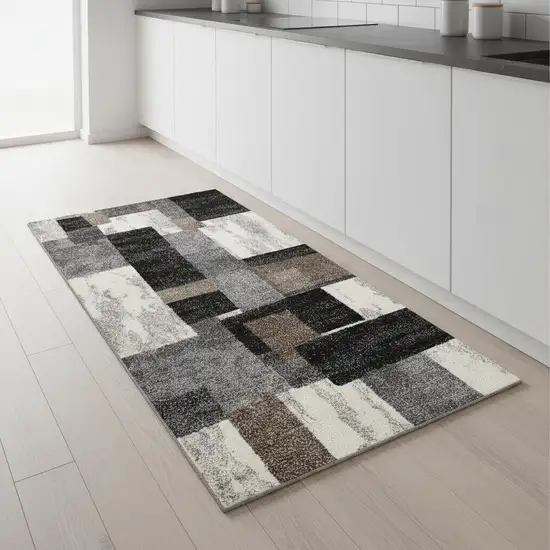 2' X 8' Brown Geometric Power Loom Stain Resistant Area Rug Photo 1