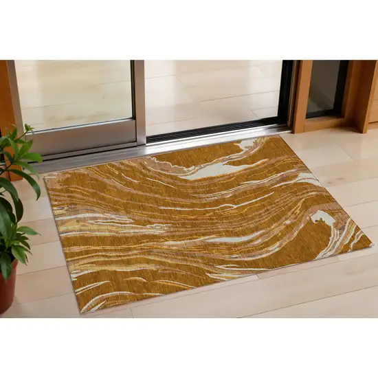 Brown Gold And Copper Abstract Washable Indoor Outdoor Area Rug Photo 1