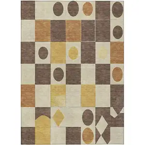 Photo of Brown Gold And Ivory Geometric Washable Indoor Outdoor Area Rug