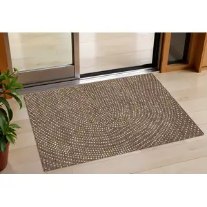 Photo of Brown Gold And Ivory Polka Dot Washable Indoor Outdoor Area Rug