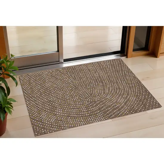 Brown Gold And Ivory Polka Dot Washable Indoor Outdoor Area Rug Photo 1