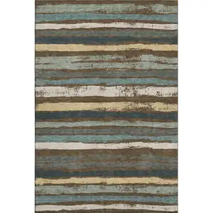 Photo of Brown Gold And Ivory Striped Washable Area Rug With UV Protection