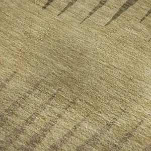 Photo of Brown Gold And Taupe Striped Washable Area Rug With UV Protection