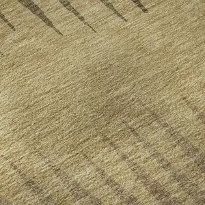 Photo of Brown Gold And Taupe Striped Washable Area Rug With UV Protection