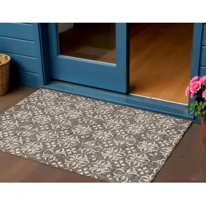 Photo of Brown Gray And Beige Floral Washable Indoor Outdoor Area Rug