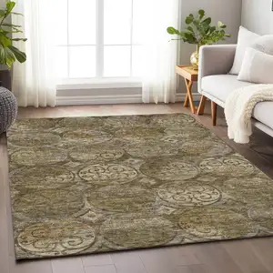 Photo of Brown Gray And Gold Medallion Washable Area Rug With UV Protection
