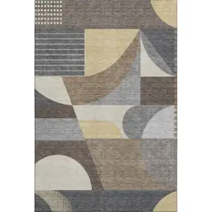 Photo of Brown Gray And Ivory Geometric Washable Area Rug With UV Protection