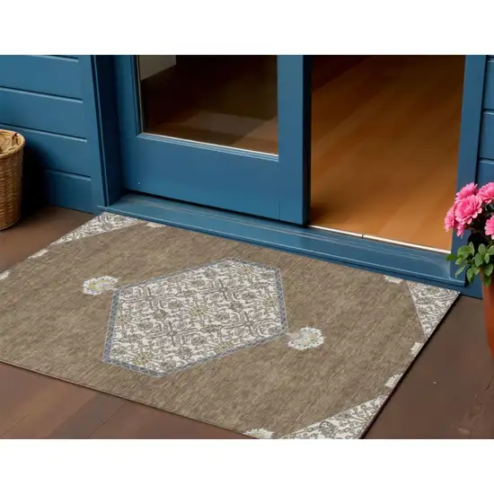 Brown Gray And Ivory Oriental Washable Indoor Outdoor Area Rug Photo 1