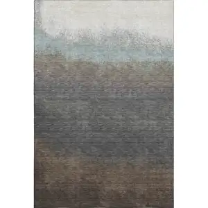 Photo of Brown Gray And Silver Ombre Washable Area Rug With UV Protection