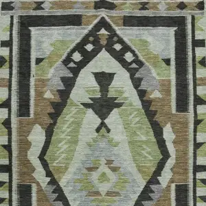 Photo of Brown Green And Charcoal Tribal Washable Area Rug With UV Protection