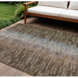 Photo of Brown Green And Ivory Abstract Washable Indoor Outdoor Area Rug
