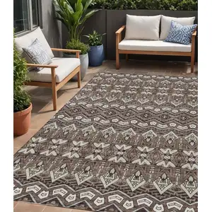 Photo of Brown Green And Ivory Moroccan Washable Indoor Outdoor Area Rug
