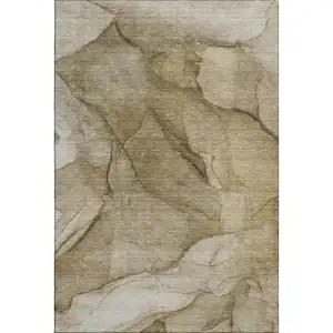 Photo of Brown Ivory And Beige Abstract Washable Area Rug With UV Protection